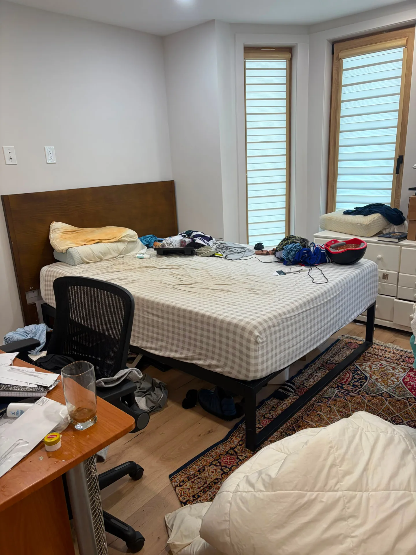 Cluttered bedroom before cleaning